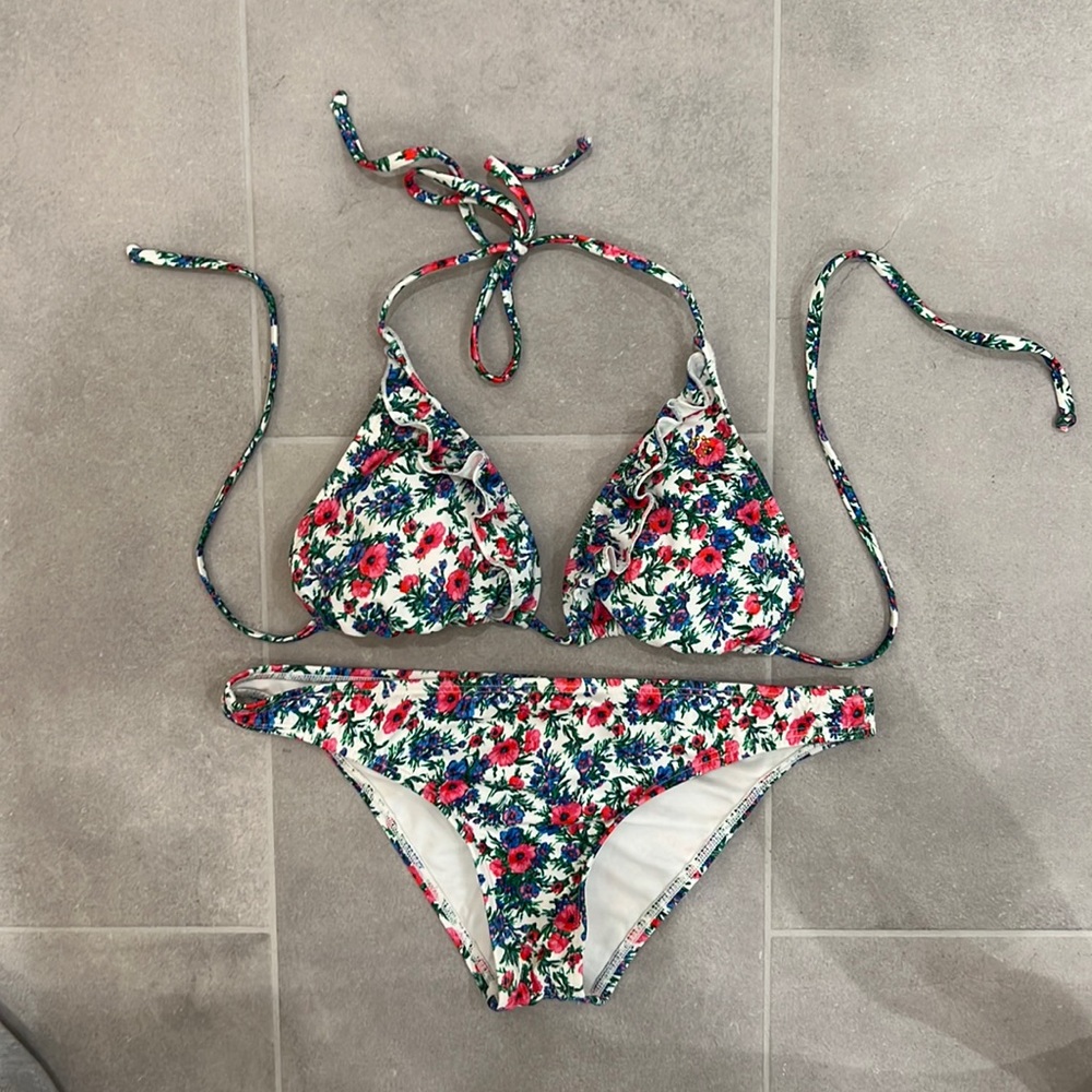 Guess swimsuit. Never worn. Top is size large, bottom is size medium